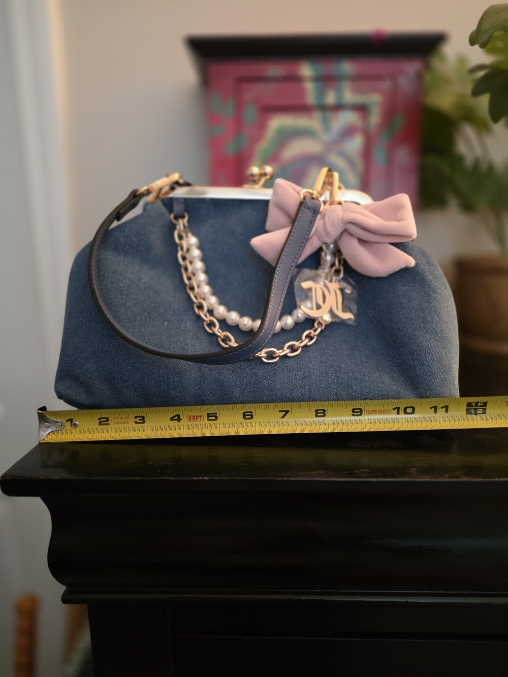 Juicy Couture Elegant Denim Kiss Lock Top Handle Bag with Pink Bow